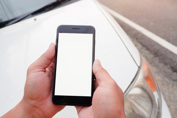 Cropped shot view of business human’s hands holding the mobile phone with blank copy space screen for your information content or text message, the woman reading text message on the smart phone during