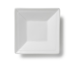 White plate placed on a white background