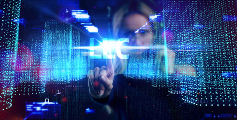 Fototapeta premium Business, Technology, Internet and network concept. Young businessman working on a virtual screen of the future and sees the inscription: LLC