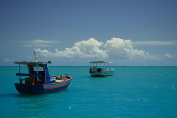 Obraz premium Boat in the blue sea. Relax time.