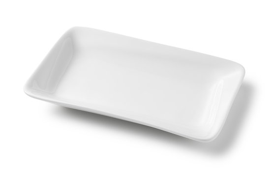 White plate placed on a white background