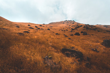 Top View Mulayit Taung golden light of the morning sun and the mist covered on Mount Mulayit,Myanmar