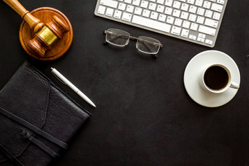 Law student office desk - gavel, computer, notebook - black, top view copy space