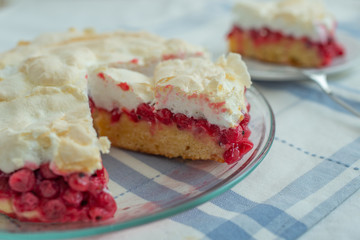 Delicious homemade tart with red currants and meringue