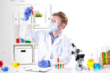 scientist working in laboratory. The doctor works in the laboratory.