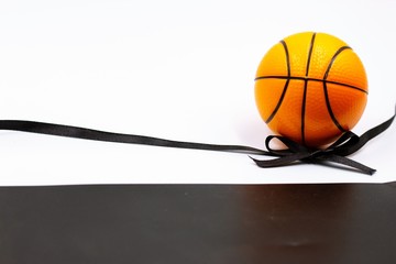 Basketball condolences with basketball and black ribbon on white background