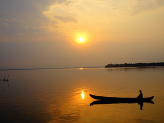 Taking a sunrise boat ride, Pathiramanal Island