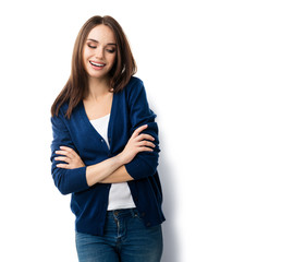 Obraz premium Portrait of brunette lovely woman in casual smart blue clothing with crossed arms, isolated against white background. Emoshions and feeling concept studio shoot.