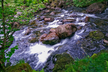 Obraz premium Fast flowing rocky stream in the Lake district Cumbria England