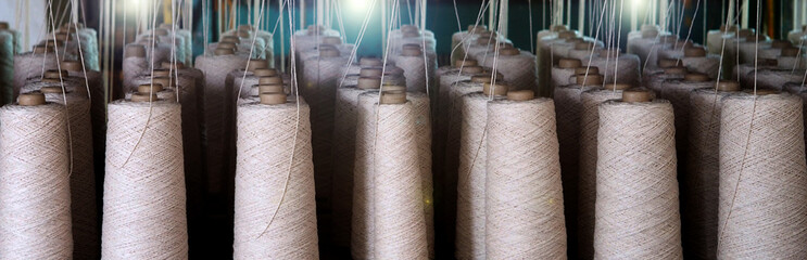 Row of textiles threads industry .