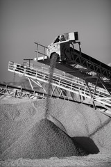 Details equipment of crushing plant, close-up, black and white. Mining industry.