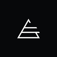 Minimal elegant monogram art logo. Outstanding professional trendy awesome artistic AE EA initial based Alphabet icon logo. Premium Business logo White color on black background