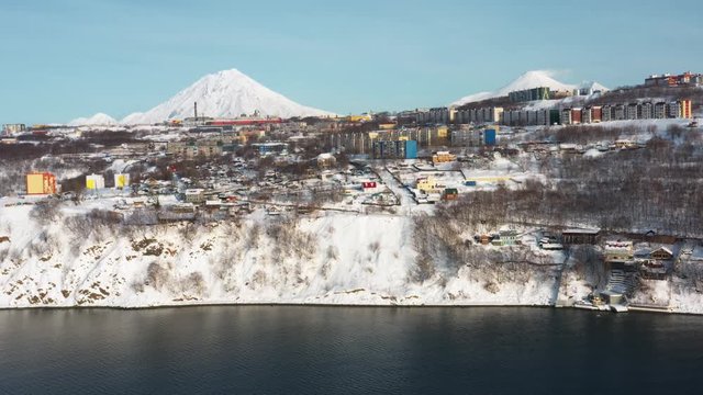 Kamchatka's home volcanoes tower over the city of Petropavlovsk-Kamchatsky. Taken in winter from a quadrocopter