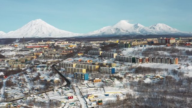 Kamchatka's home volcanoes tower over the city of Petropavlovsk-Kamchatsky. Taken in winter from a quadrocopter