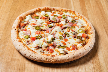 pizza on the wooden background
