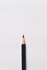 
black pencil on a white background