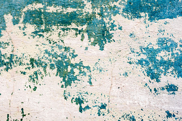 Texture of a concrete wall with cracks and scratches which can be used as a background