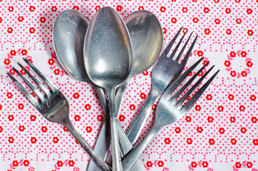 pile of old spoons and forks