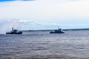 Extinguishing a burning ship during naval exercises