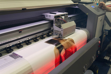 Large format printing machine in operation. Industry