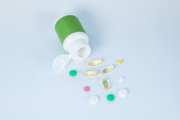 Different capsules and pills on the table