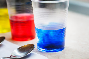 plastic cups with multi-colored water, food paint, creativity, multi-colored water, crafts, cooking