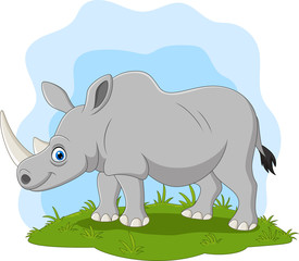 Cartoon happy rhino on the grass