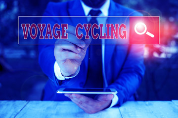 Conceptual hand writing showing Voyage Cycling. Concept meaning Use of bicycles for transport...