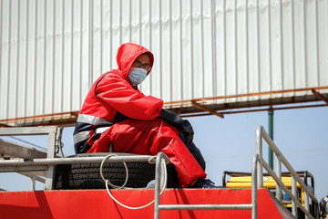  Disinfectant worker in protective suit with mask.  prevent the spread of coronavirus (Covid-19). Qalqilya, Palestinian Territories, Palestine, April 15, 2020.