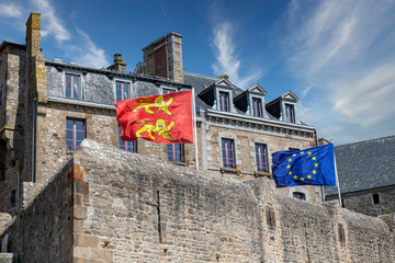 Norman and European flags on the ramparts of Saint Malo, France - obrazy, fototapety, plakaty