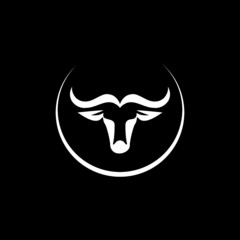 Bull head logo or emblem on dark background