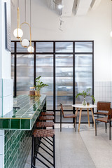 Modern kitchen with large green bar