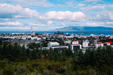 view of the central part of Reykjavik from an observation deck from a height in the afternoon in summer