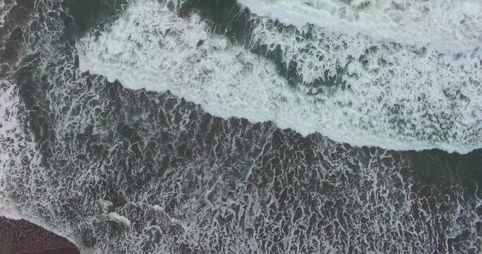 Aerial view of sea waves in hindia ocean in parangtritis beach,indonesia