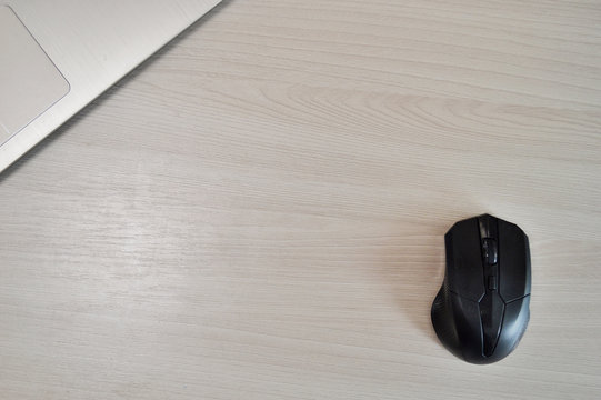 A keyboard of a laptop computer. Create your own keyboard. wooden background