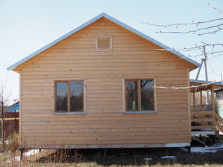 A new garden house being built with wood,