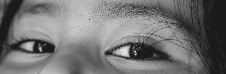 Asian young girl's eye. Black and white