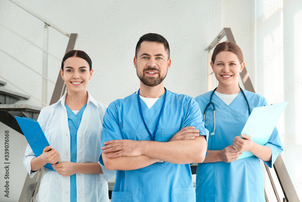 Poster Group of doctors in hospital. Medical service