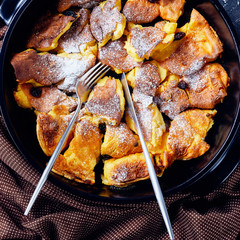 Austrian shredded pancake with raisins, flat lay