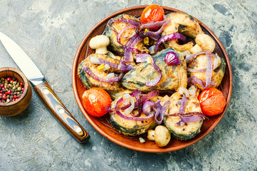 Mackerel fried in onions and tomatoes