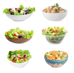 Set with different salads on white background