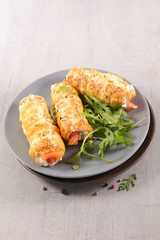 puff pastry rolled with cheese cream and smoked salmon