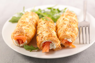 puff pastry rolled with cheese cream and smoked salmon