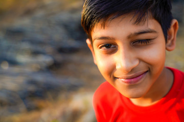 Portrait of beautiful winking little boy