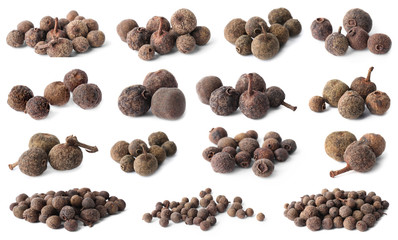 Set of different peppercorns on white background