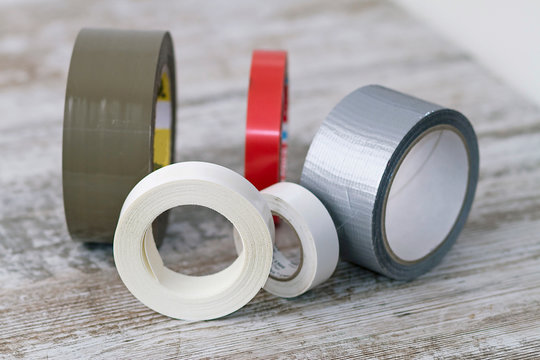 Rolls of adhesive tape of different types