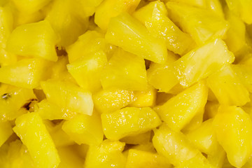 Pieces of chopped pineapple for the background