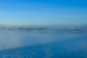 City Kremenchug in fog on autumn day