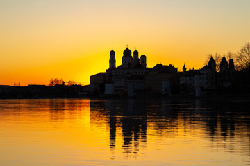 Fototapeta na wymiar Cityscape of Passau with famous St. Stephan'c Cathedral at the confluence of Danube, Inn and Ilz at dusk