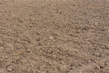 Background of the plowed field prepared for sowing
